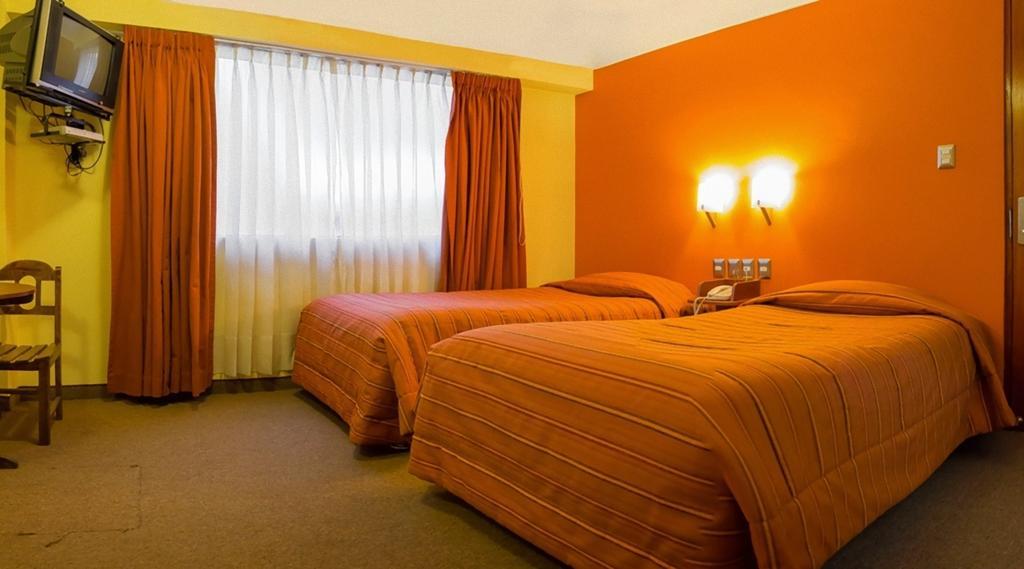 Mosoq Inn Puno Habitación foto