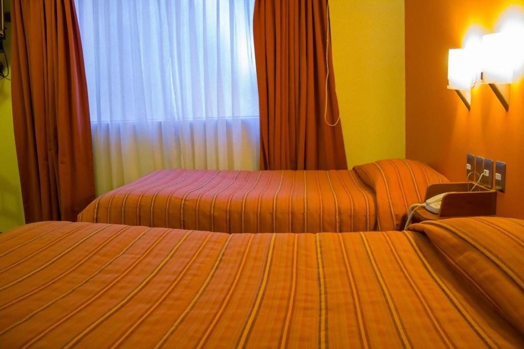 Mosoq Inn Puno Habitación foto