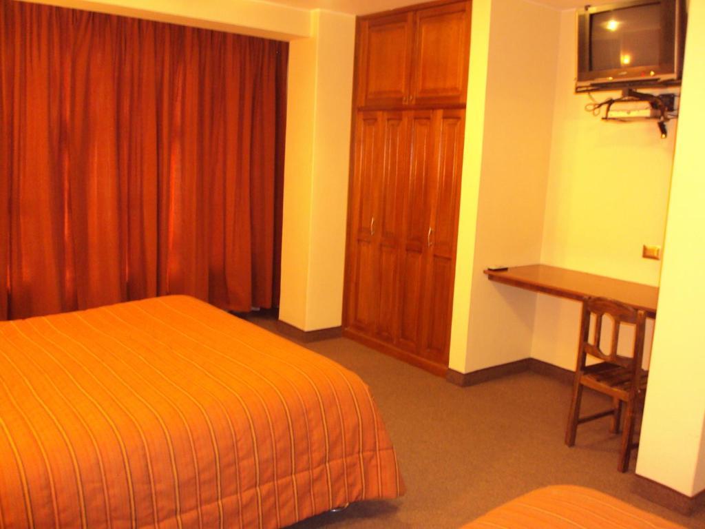 Mosoq Inn Puno Habitación foto
