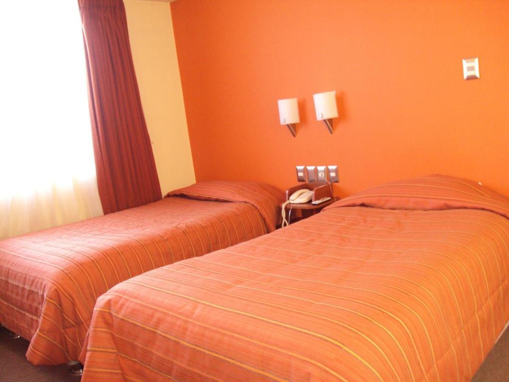 Mosoq Inn Puno Habitación foto
